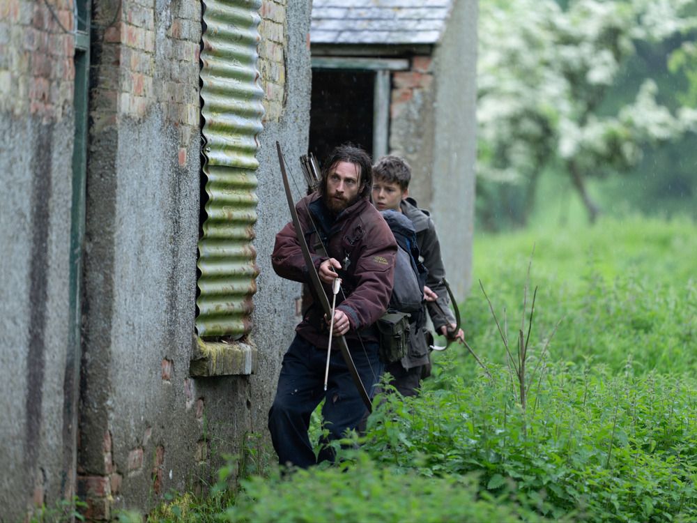  “Britain has paused.” From left, Jamie (Aaron Taylor-Johnson) and his son Spike (Alfie Williams) in 28 Years Later.
