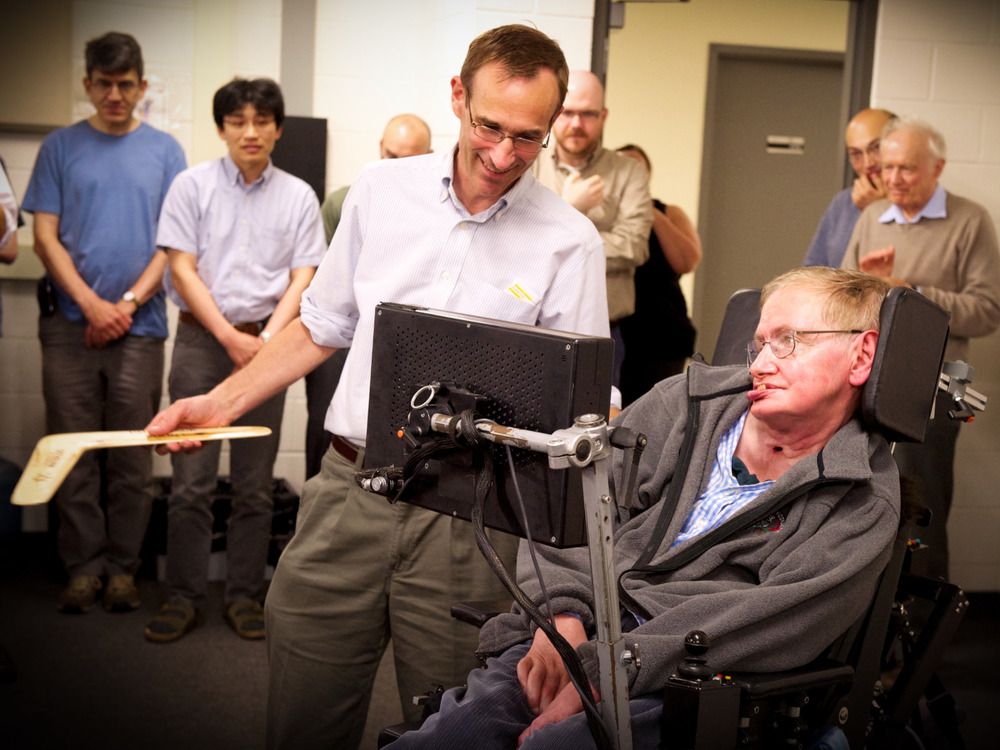  Raymond Laflamme presents his mentor Stephen Hawking with a boomerang in 2010.