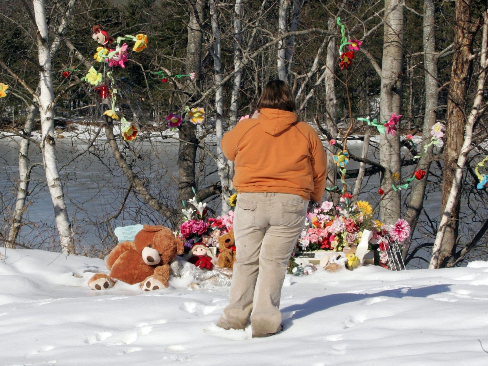  The memorial site along the river bank in 2009 where Karissa’s body was found still exists today.