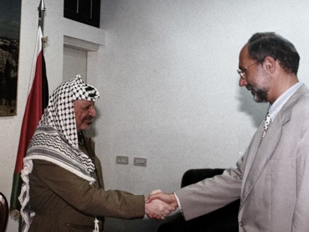 Undated photo of Norman Spector, right, meeting with Palestinian Authority president Yasser Arafat.