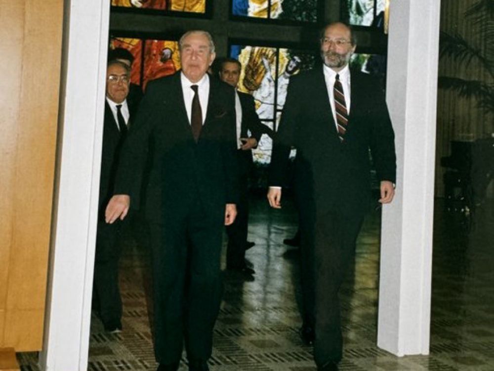  Undated photo of Norman Spector, right, exiting the Knesset with Israeli president Chaim Herzog.