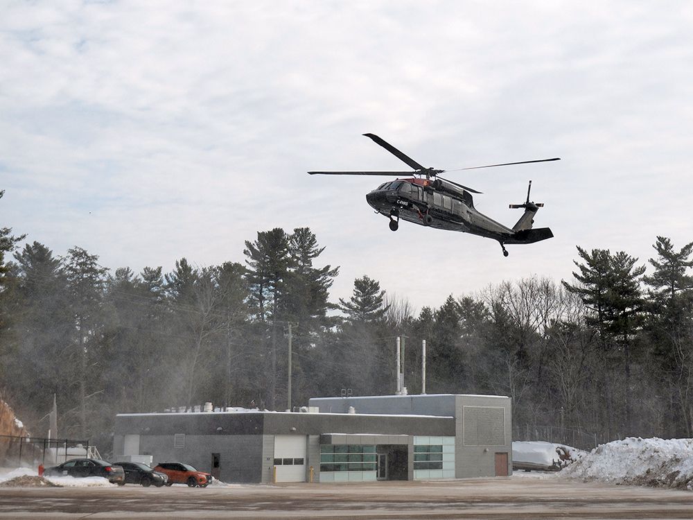  An RCMP Sikorsky UH-60 Black Hawk helicopter lands at the Canada Border Services Agency port of entry in Lansdowne, Ont., on Feb. 12, 2025.