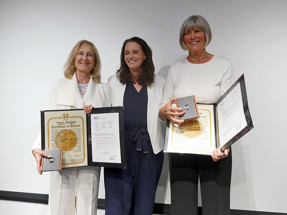  Elizabeth Quinlan, left, and Jantina Veldboom Devries, right, with Israel’s consul general Idit Shamir. Quinlan accepted the Righteous Among the Nations honour on behalf of her grandparents, while Veldboom Devries accepted the honour on behalf of her parents, in Toronto on June 26, 2025.