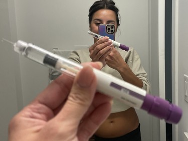 Antoinette Twiver, 28, snaps a selfie of herself with her first hormonal shot for egg freezing.