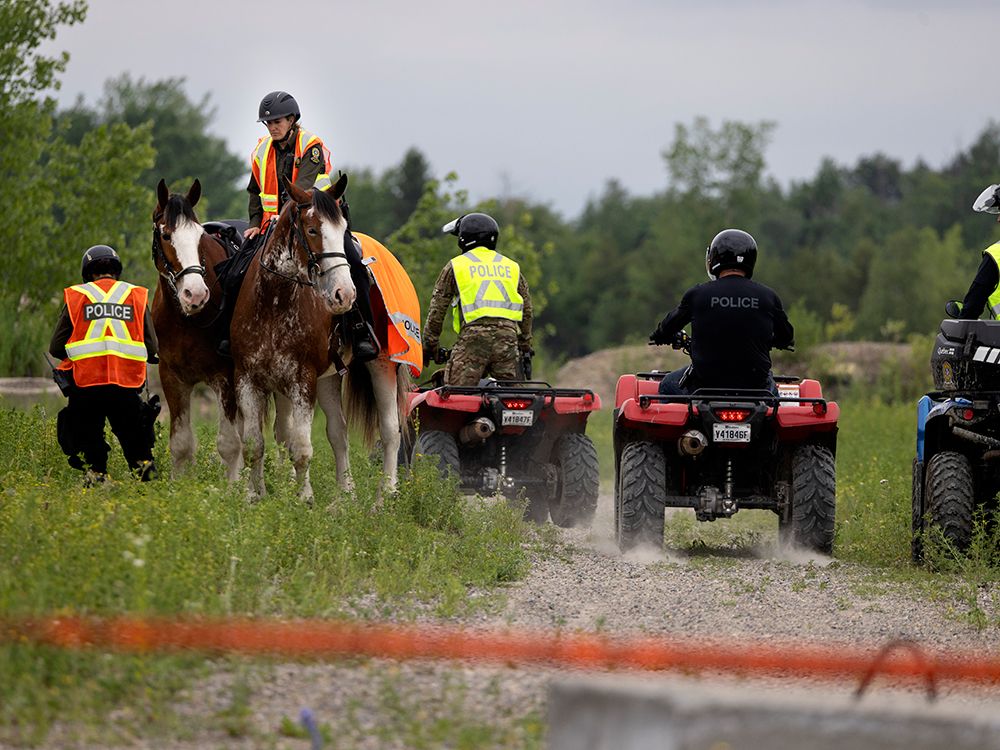  Police search for missing 3-year-old Claire Bell at an old sand pit near St-Télesphore, west of Montreal, on Wednesday, June 18, 2025. The girl was found by a drone in Ontario the same day.