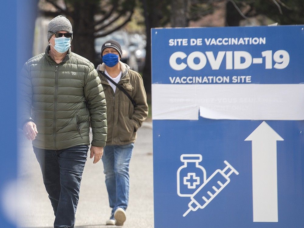  People at a COVID-19 vaccination site in Montreal, Sunday, April 18, 2021.