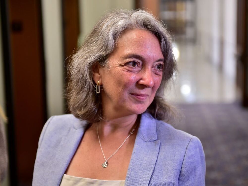 Environment Minister Julie Dabrusin speaks with reporters outside of the Liberal cabinet meeting in West Block on Tuesday, June 10, 2025.