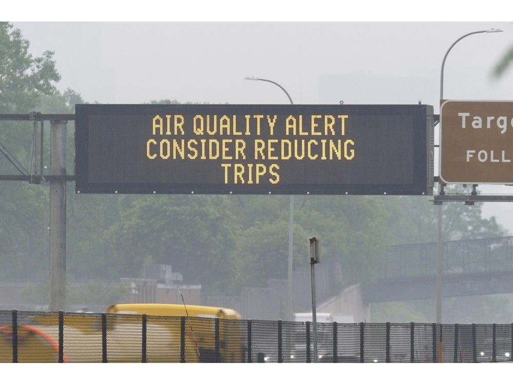 A sign warns of an air quality alert as smoke from wildfires burning in Canada reaches Minneapolis, Minn., on Tuesday, June 3, 2025.  A sign warns of an air quality alert as smoke from wildfires burning in Canada reaches Minneapolis, Minn., on Tuesday, June 3, 2025.