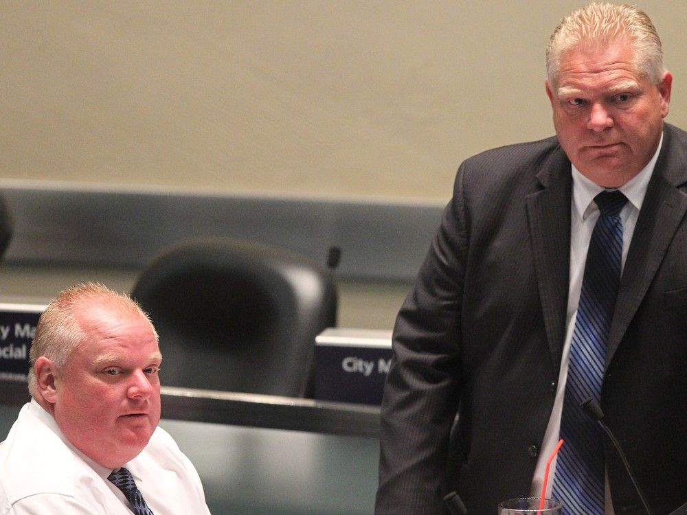  Former Toronto mayor Rob Ford and his brother, current Ontario Premier Doug Ford, at a Toronto council meeting on July 7, 2014.