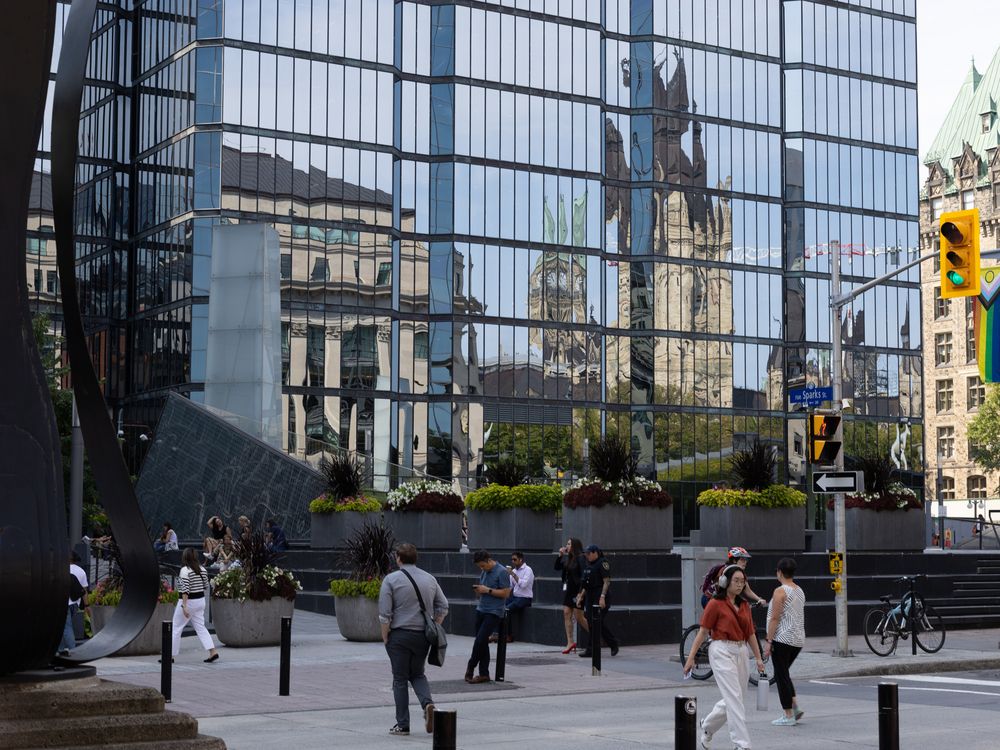 NextImg:New report says Ottawa to blame for higher consumer prices after spending splurge