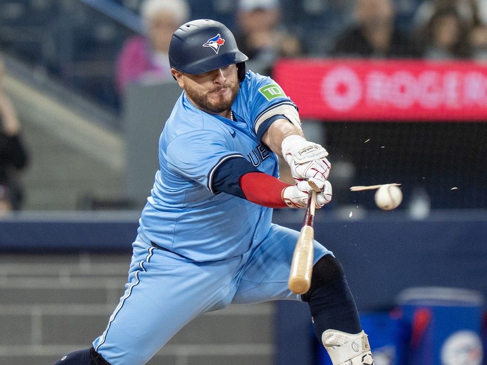  Toronto Blue Jays catcher Alejandro Kirk (30) hits a broken bat single during a game against the Cleveland Guardians in Toronto on Sunday, May 4, 2025.