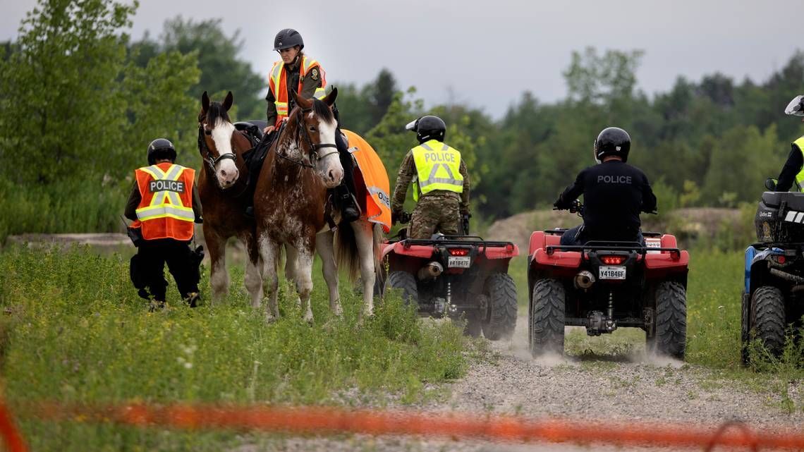 Police scan an old sand pit near St-Télesphore, west of Montreal, during the search for a three-year-old girl June 18, 2025 Police scan an old sand pit near St-Télesphore, west of Montreal, during the search for a three-year-old girl June 18, 2025