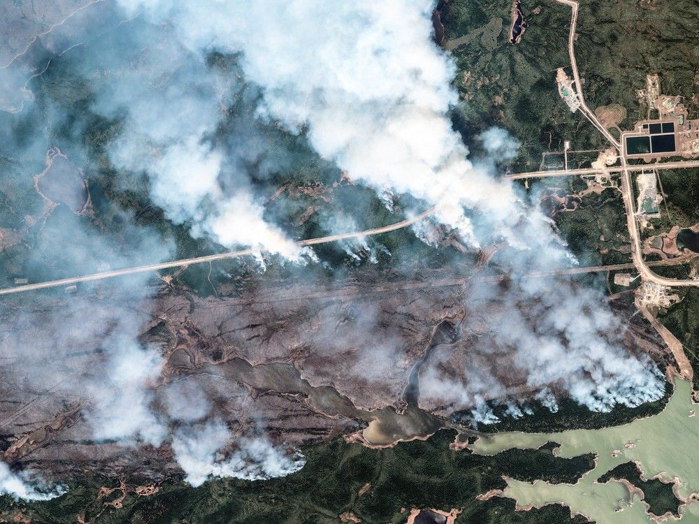  This handout satellite picture courtesy of Maxar Technologies shows an overview of York Factory First Nation wildfire in Manitoba, Canada on May 30, 2025.