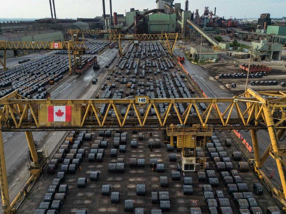 An aerial view of steel coils sitting in the yard at ArcelorMittal Dofasco's steel mill on June 9, 2025 in Hamilton, Canada. 