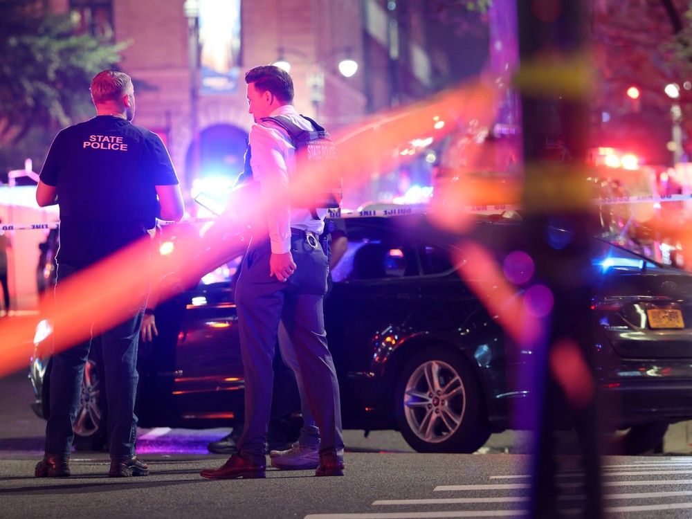 NextImg:Gunman who killed 4 at NYC building was targeting NFL offices but took wrong elevator, mayor says