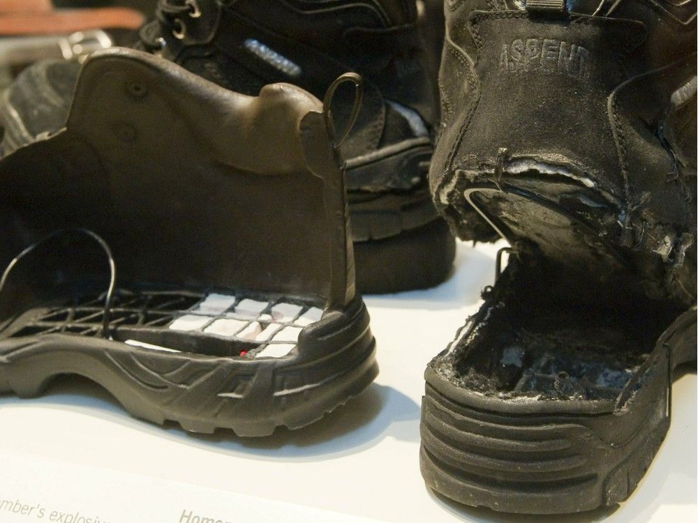  The shoes used in the failed attempt to blow up an airplane by shoe bomber Richard Reid are displayed alongside an FBI model of the shoe filled with explosives as part of an exhibit at the Newseum in Washington, DC.