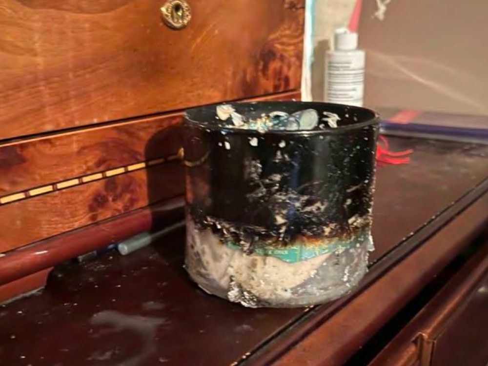  This photo shows a candle that Renita Francois says exploded in her face moments after it was lit in her Long Island home, according to a lawsuit.