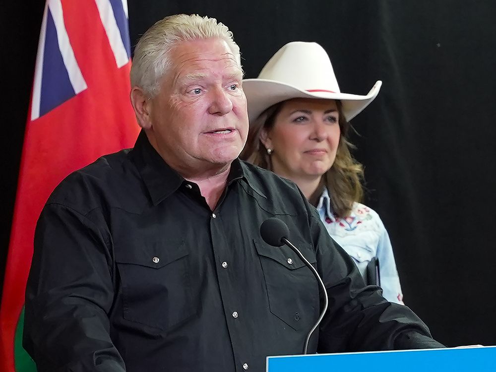 Ontario Premier Doug Ford and Alberta Premier Danielle Smith hold a news conference in Calgary on Monday, July 7, 2025.