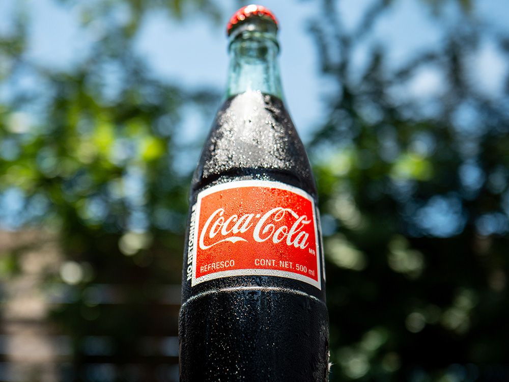 NextImg:Coca-Cola to release new Coke with sugar. Trump says it's 'better' than corn syrup. Is it?