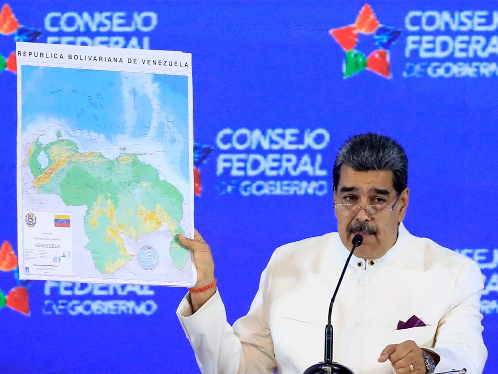 Venezuela's President Nicolas Maduro speaks about his intention to declare a Venezuelan province in an oil-rich region it disputes with Guyana, on Dec. 5, 2023.