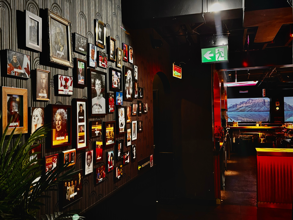  The Wall of Heroes at Grizzly Bar in Toronto, which became something of a watering hole for New York magazine writer Simon van Zuylen-Wood.