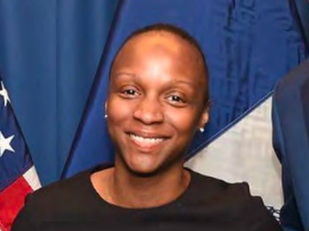Renita Francois poses for a photo in 2019. Francois has filed a lawsuit against an American retailer and a Canadian company after she says she was severely burned by an exploding candle.
