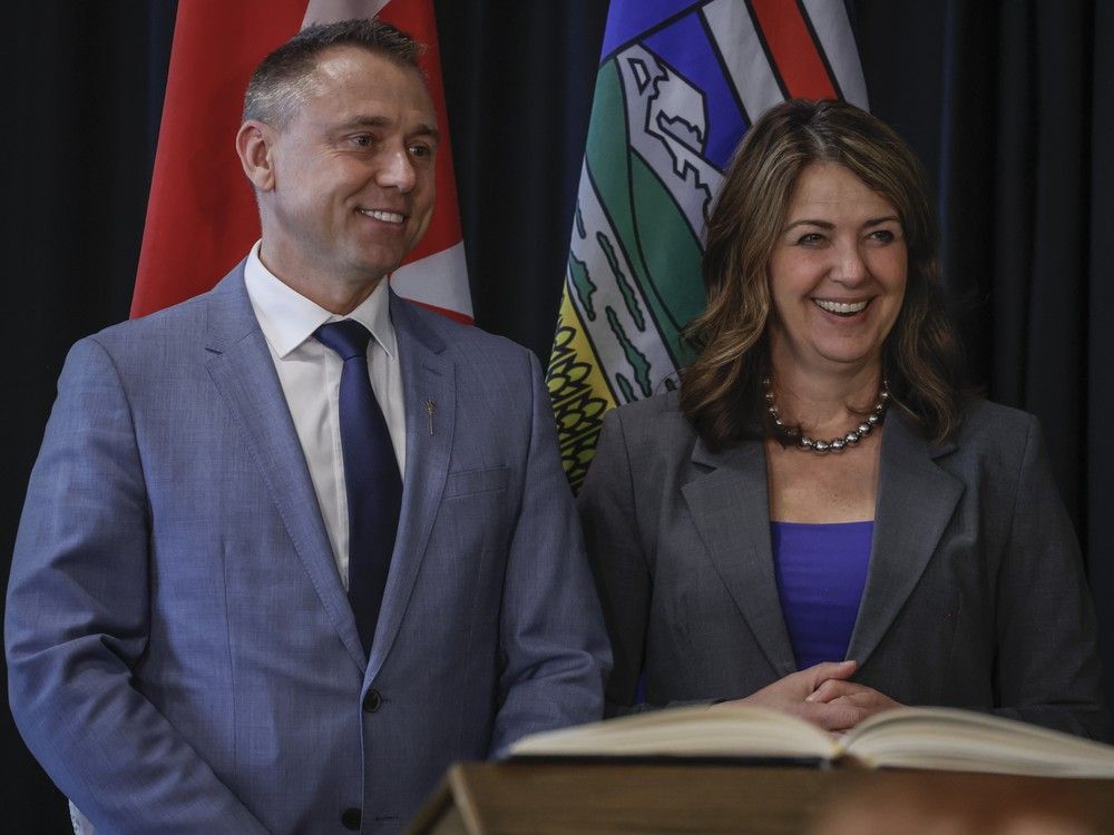 Alberta Premier Danielle Smith with new Minister of Tourism and Sport, Andrew Boitchenko, following a swearing in ceremony in Calgary, Alta., Friday, May 16, 2025.THE CANADIAN PRESS/Jeff McIntosh