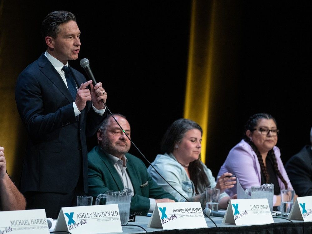 NextImg:Pierre Poilievre draws cheers and criticism at Alberta byelection debate