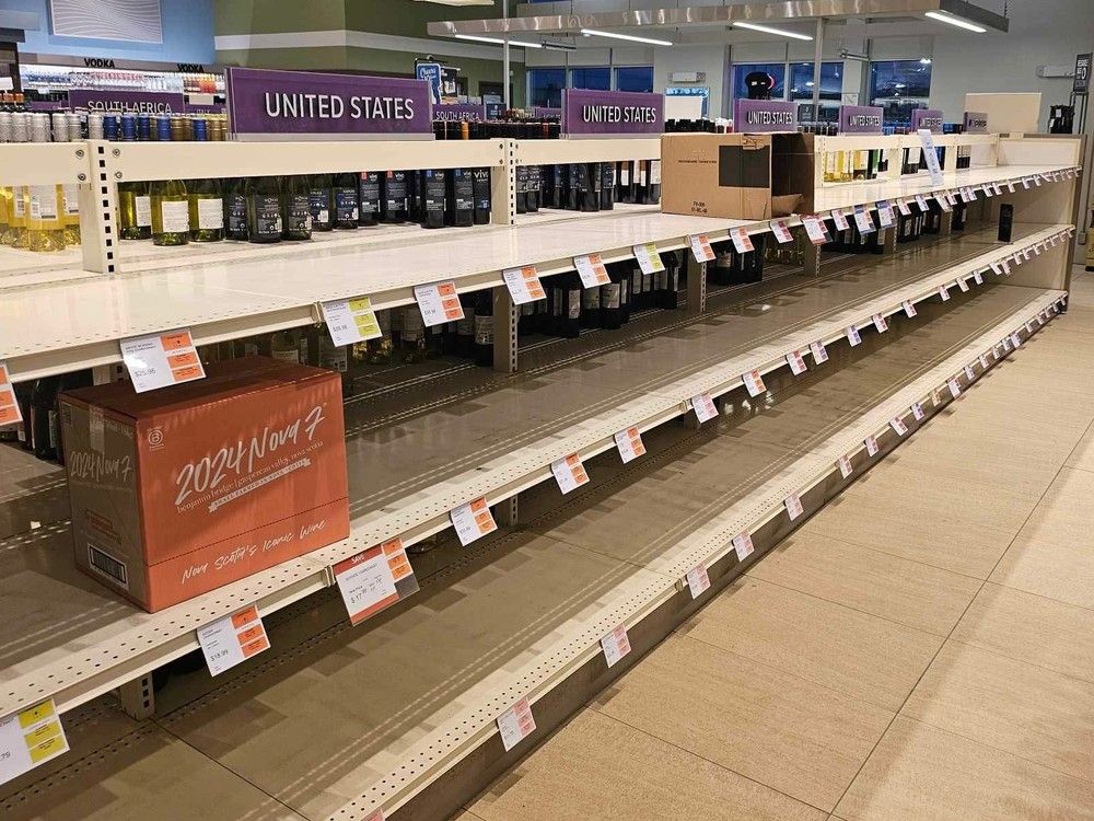 Empty shelves where alcohol and wine from the United States used to be at the NSLC (Nova Scotia Liquor Commission). Canada is lifting tariffs on U.S. alcoholic beverages, but some provincial bans on the sale of American beer, wine and spirits remain.