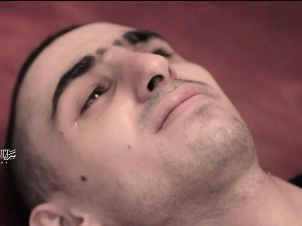 Hostage Rom Braslavski is seen in a terrorist video released on July 31.  Hostage Rom Braslavski is seen in a terrorist video released on July 31.