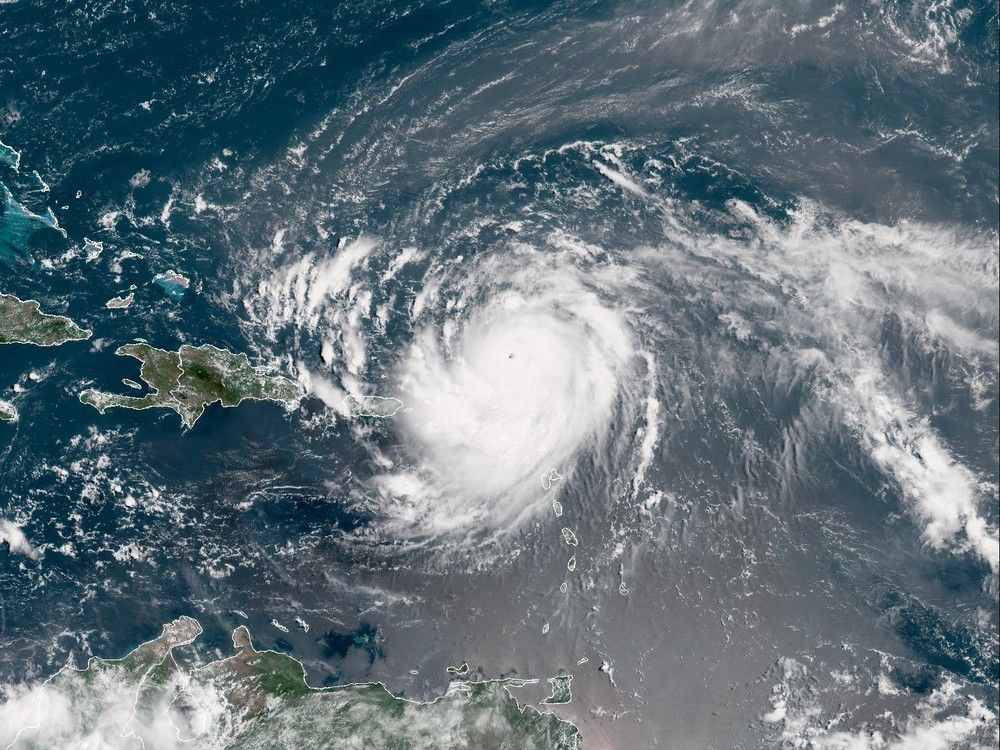 NextImg:Hurricane Erin downgraded to Category 3, expected to turn northward: meteorologists
