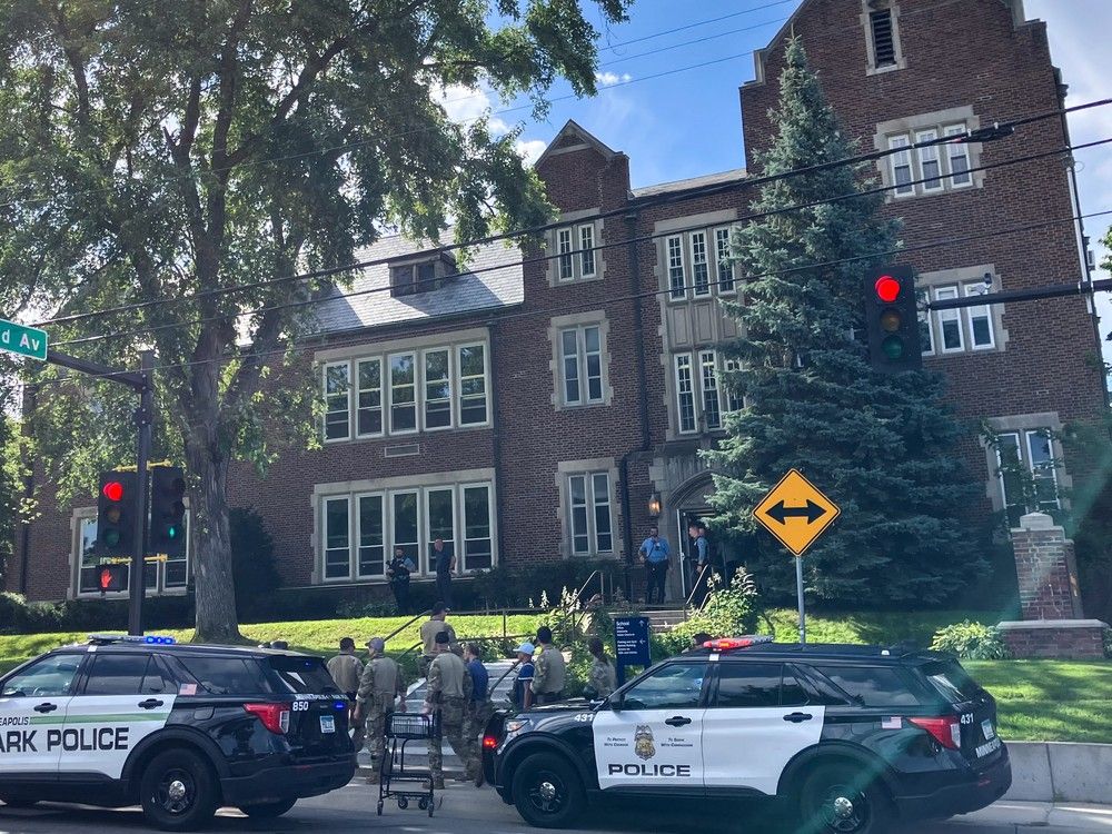 Police and first responders work at the scene of a shooting near Annunciation Church and Catholic School in Minneapolis, Minneosta, on August 27, 2025. Police and first responders work at the scene of a shooting near Annunciation Church and Catholic School in Minneapolis, Minneosta, on August 27, 2025.