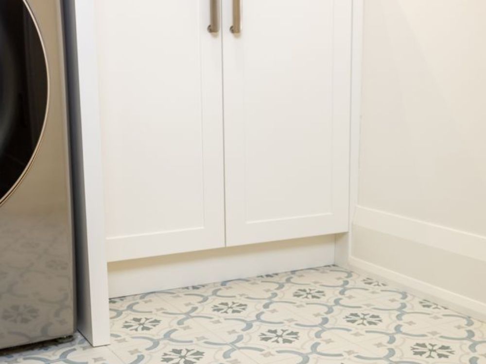 Floor tile in the laundry room reflects the rest of the summer palette of the house. Floor tile in the laundry room reflects the rest of the summer palette of the house.
