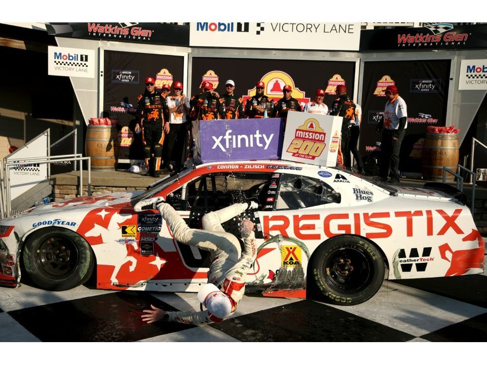 NextImg:NASCAR driver breaks collarbone in dramatic fall from car he climbed to celebrate win