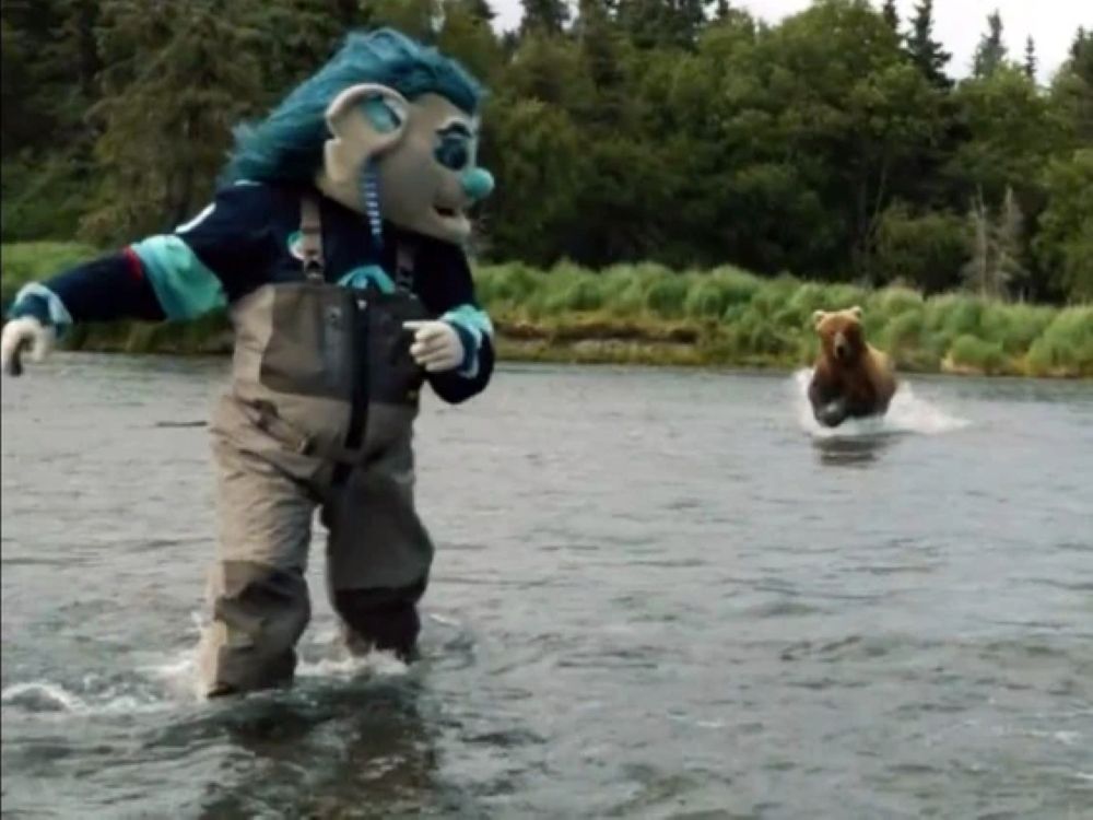 NextImg:Seattle Kraken mascot, player have close call with charging grizzly in Alaska