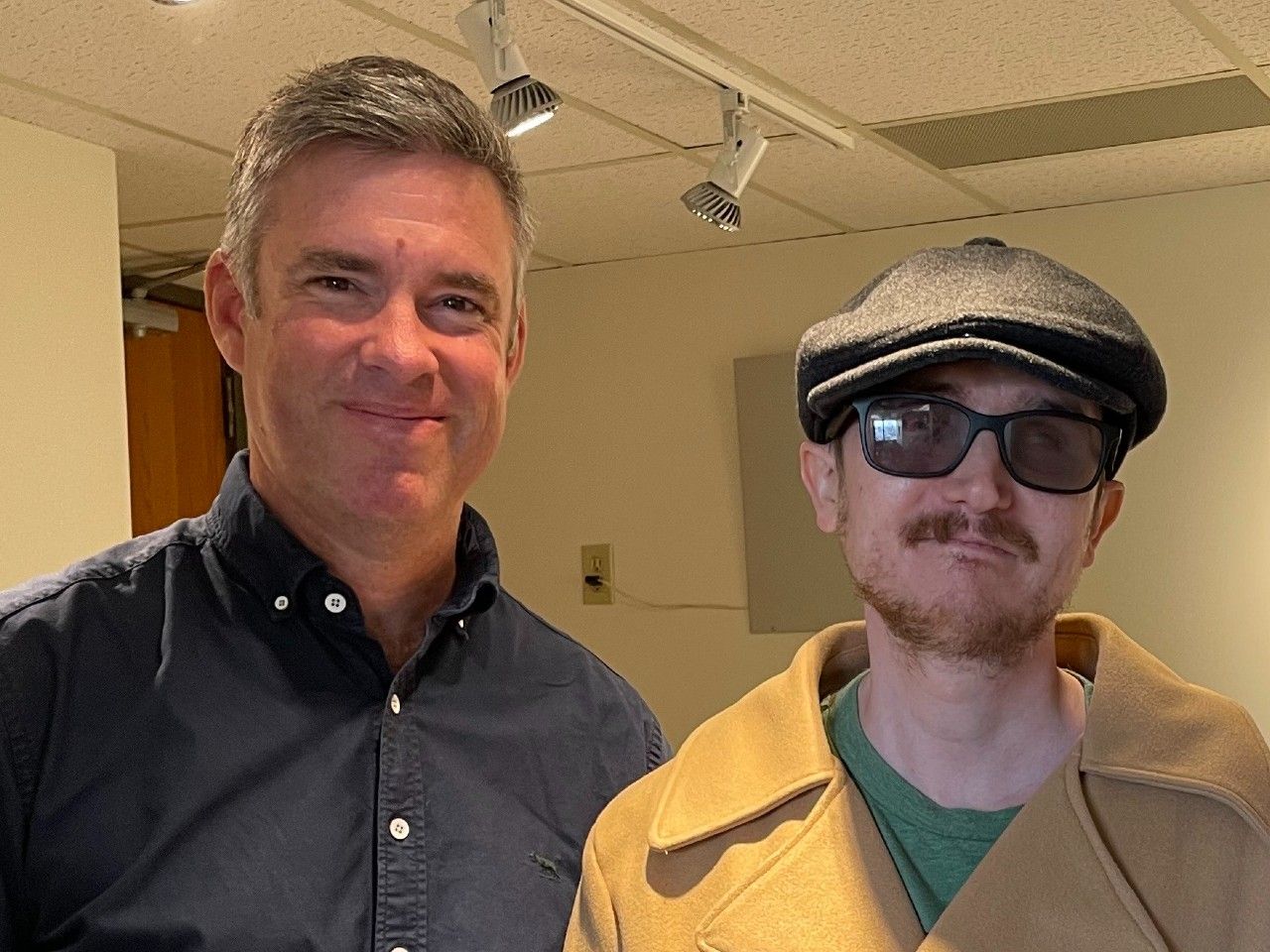 Ophthalmologist Dr. Greg Moloney, left, is one of four surgeons who successfully performed a tooth-in-eye surgery on Brent Chapman, restoring his sight after almost two decades of blindness.