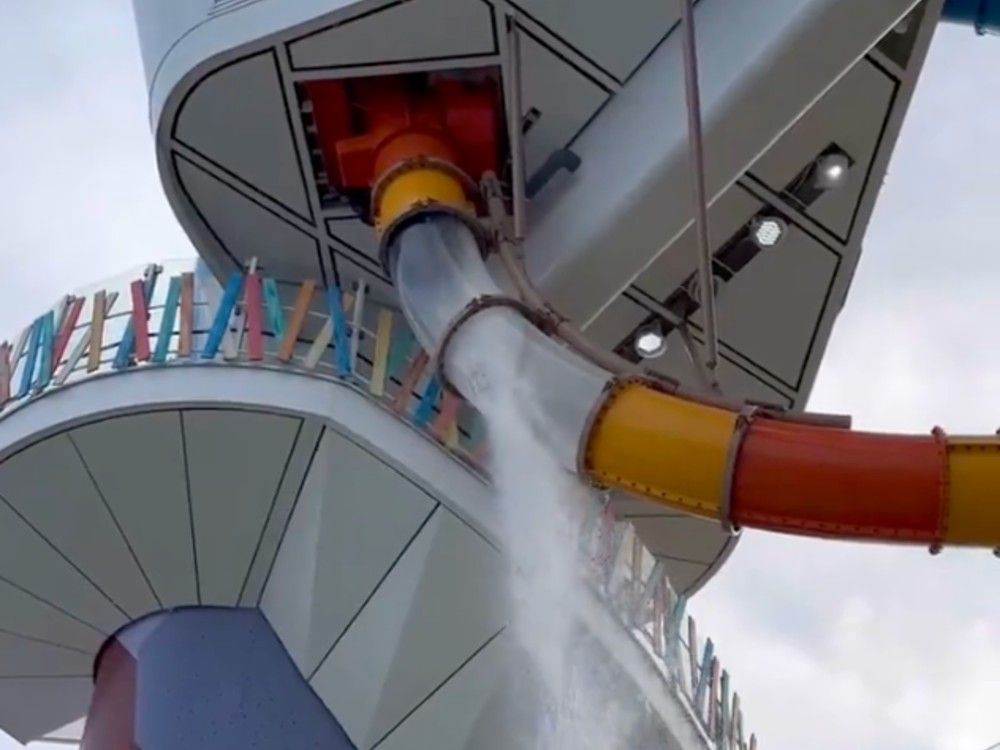 NextImg:Video shows water pouring out of cruise ship slide after glass shatters, injuring passenger