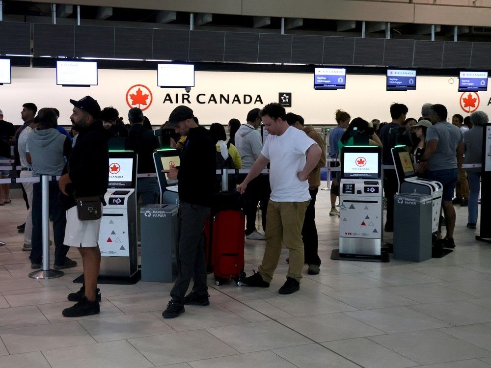 NextImg:Air Canada agrees to pay for flight cancellation costs, including hotel stays