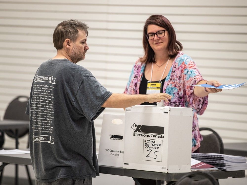  A voter casts their vote for the Battle River-Crowfoot byelection in Camrose, Alberta on Monday August 18, 2025.