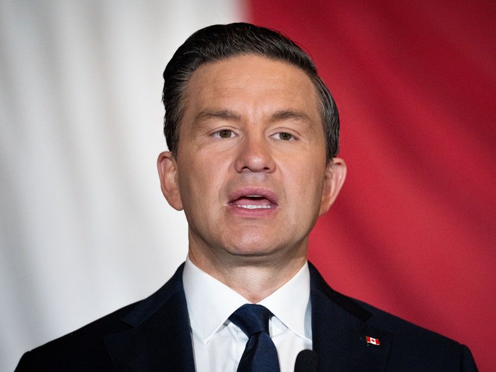 NextImg:Poilievre calls for Bishnoi Gang to be designated a terrorist group as part of tough-on-crime agenda