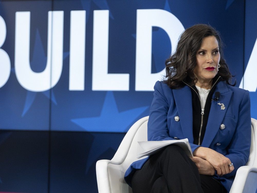 NextImg:Michigan auto jobs depend on changing course on tariffs, Whitmer tells Trump