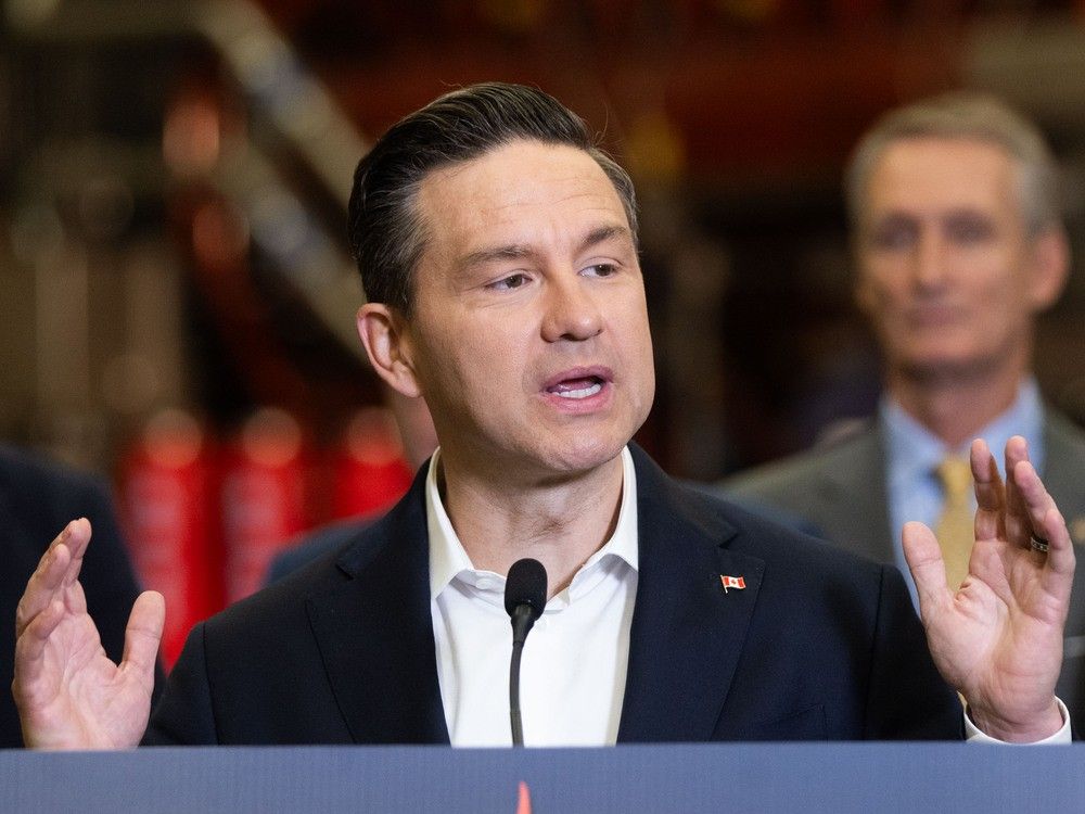 NextImg:Poilievre says Liberal EV mandate akin to 'banning rural life'