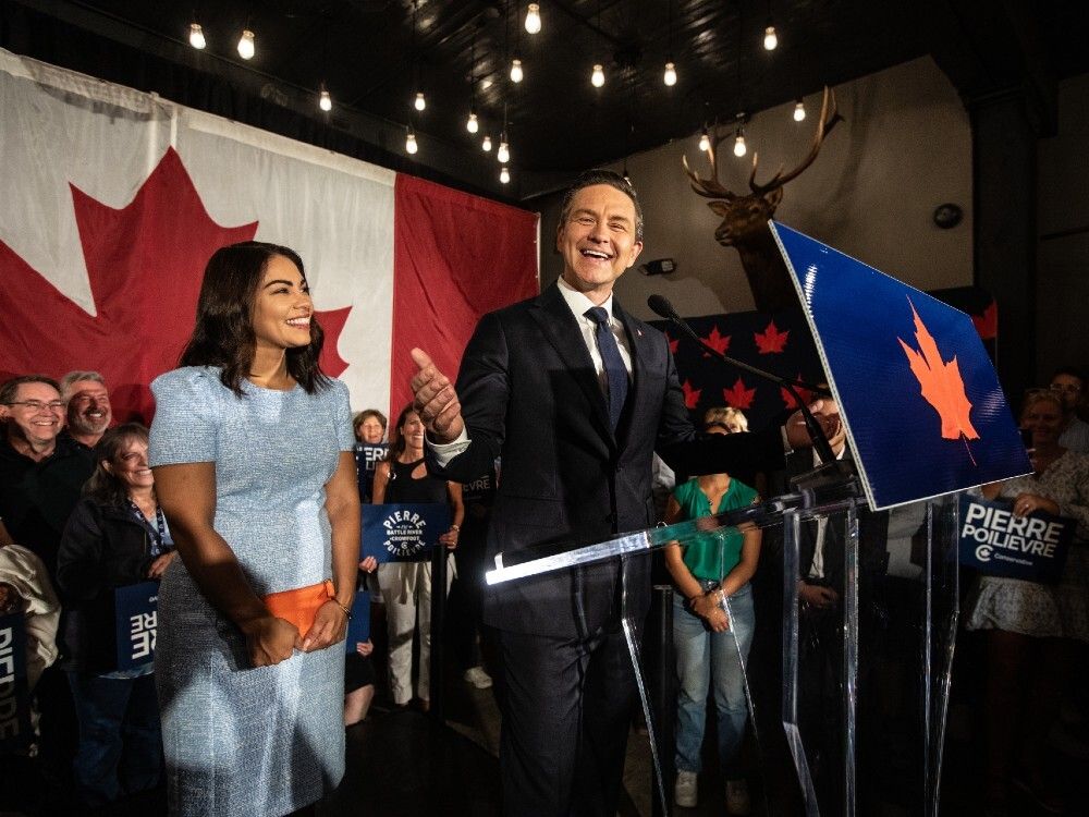 Anaida Poilievre and Conservative Party Leader Pierre Poilievre celebrate the win during the Battle River-Crowfoot byelection in Camrose, Alta., Monday, Aug. 18, 2025. 