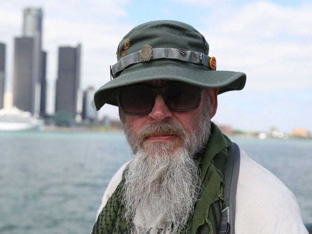  Dan Livers, of Michigan, who kayaked across the Detroit River on Aug. 5, 2025, is shown on the Windsor waterfront with Detroit in the background on Aug. 21, 2025. Photo by Millar Holmes-Hill /Windsor Star