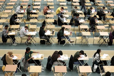 Rows of students in desks.
