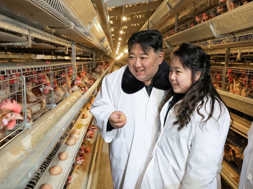  This picture taken on January 7, 2024 and released from North Korea’s official Korean Central News Agency (KCNA) via KNS on January 8, 2024 shows North Korea’s leader Kim Jong Un inspecting the newly built Gwangcheon Poultry Factory with his daughter Ju Ae.