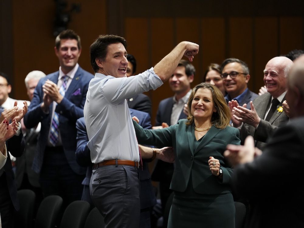 Deputy Prime Minister and Minister of Finance Chrystia Freeland gets a shout-out from Prime Minister Justin Trudeau  during a caucus meeting on Parliament Hill  in Ottawa on Wednesday, April 17, 2024.  THE CANADIAN PRESS/Sean Kilpatrick