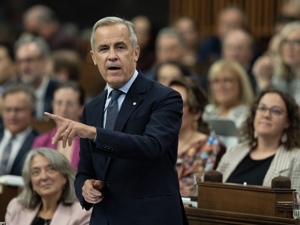 Prime Minister Mark Carney rises during Question Period, on Parliament Hill in Ottawa, Monday, Sept. 15, 2025.