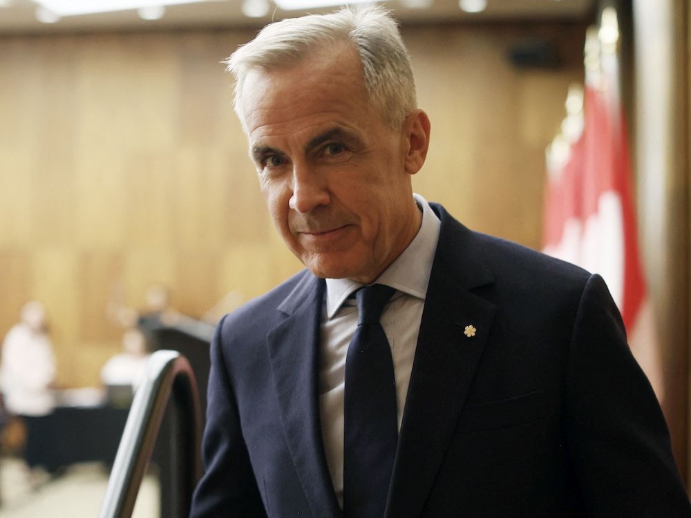 NextImg:Tasha Kheiriddin: Carney takes us backwards with Americans on trade