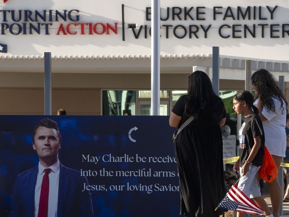  Arizonans mourn Turning Point USA Founder Charlie Kirk outside of the Turning Point USA headquarters on September 10, 2025 in Phoenix, Arizona.